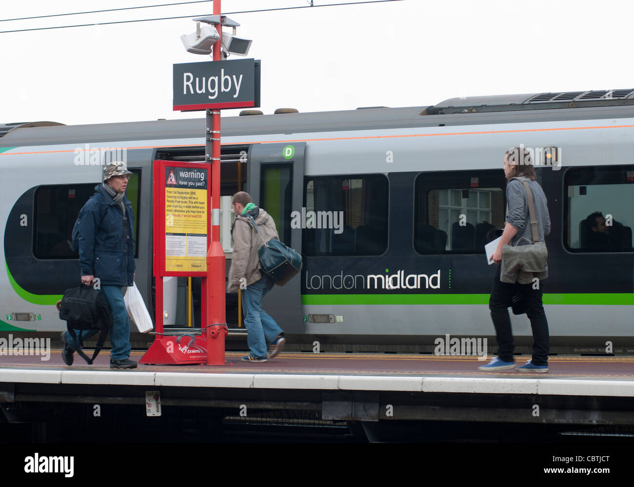 London Midland electric train stopped at Rugby railway station ...