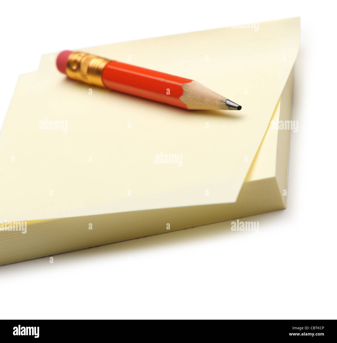Paper note and a red pencil. It is isolated on a white background Stock ...