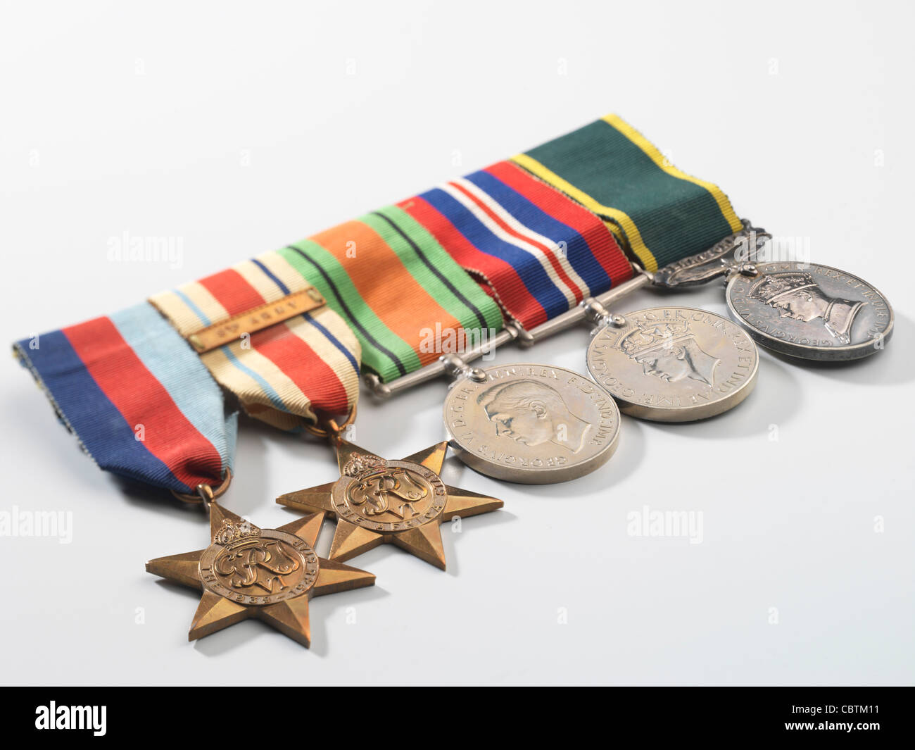 Medals awarded during WW2, including the 8th Army Africa Star, The Defence Medal, and The Territorial Army Medal. Stock Photo