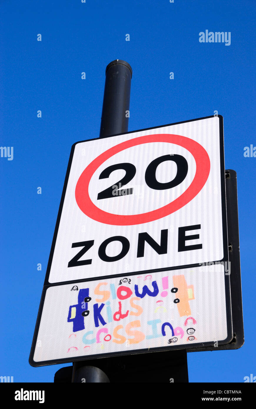 20 miles per hour speed limit zone road sign Stock Photo
