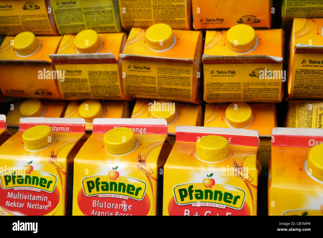 Fruit juice cartons displayed in a shop window Stock Photo Alamy