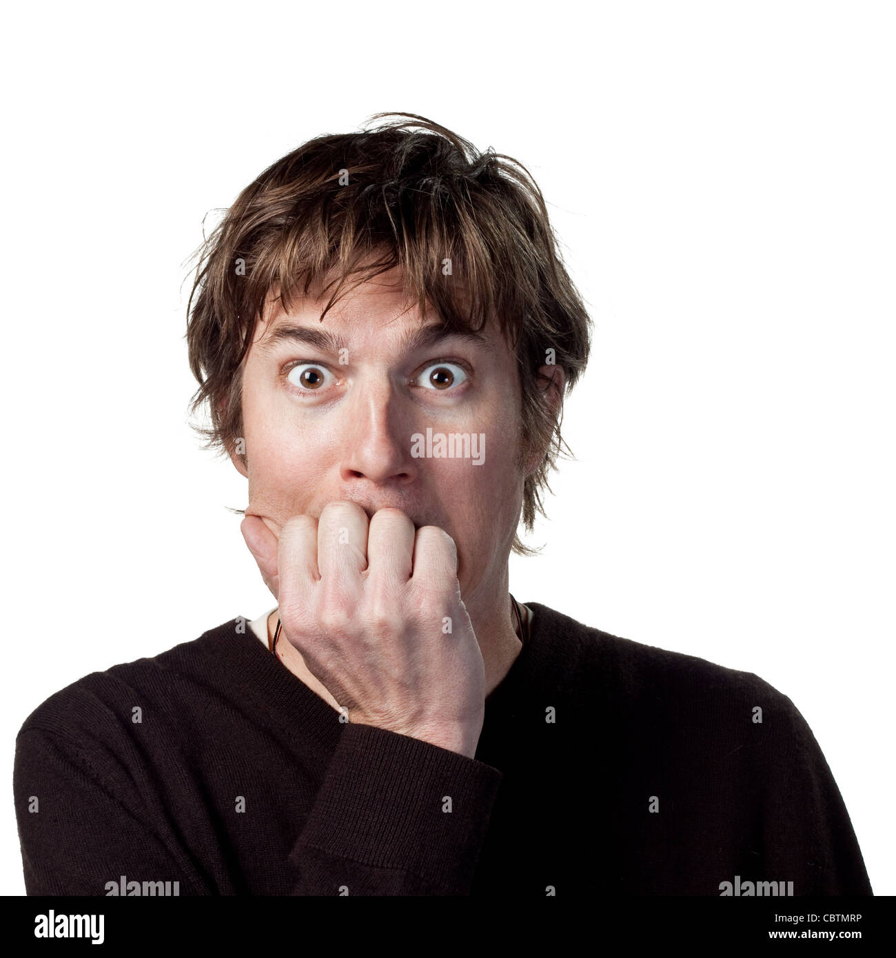 Frightened young man Stock Photo - Alamy