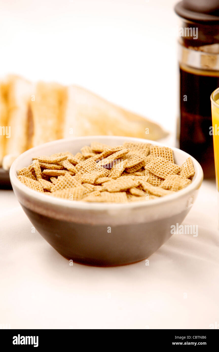 Breakfast cereal on a glass table with coffee, Orange Juice, toast, boiled egg Stock Photo