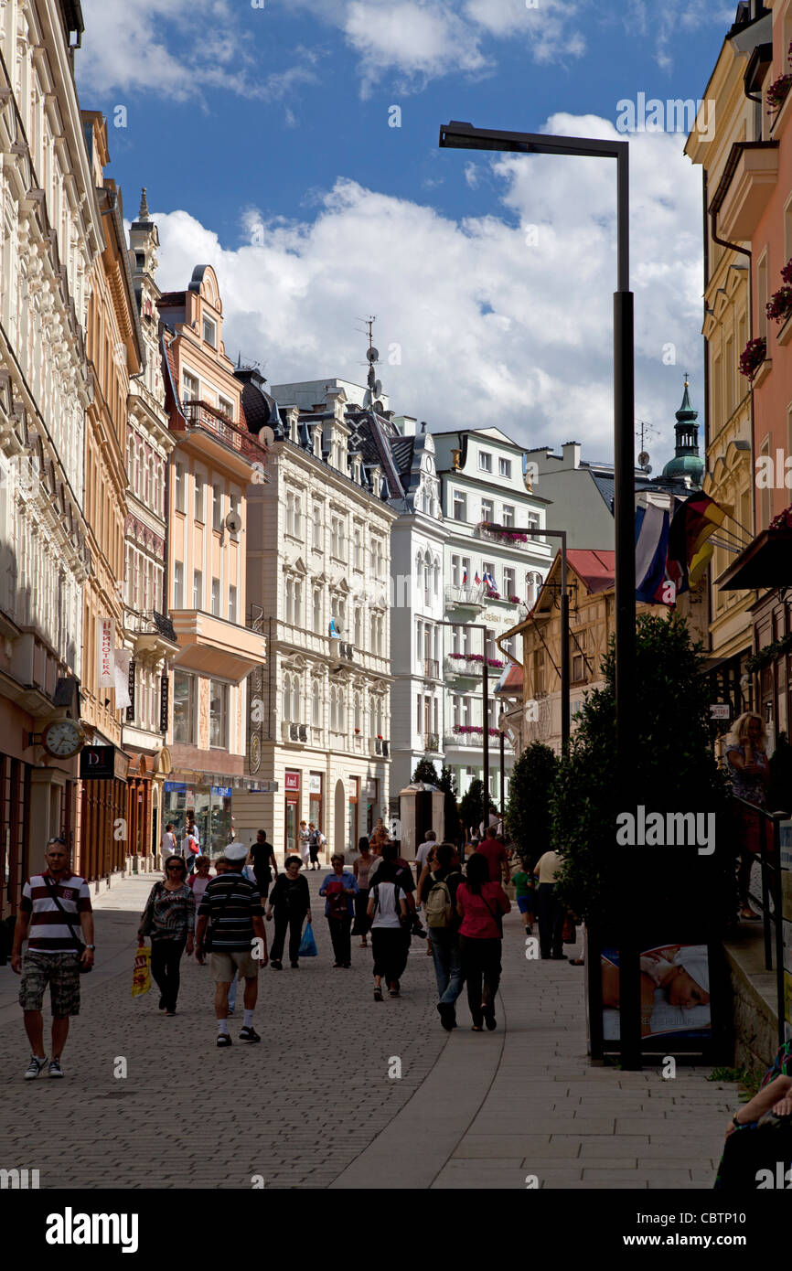 Tourists walking along the main shopping street in Karlovi Vari Karlsbad, Western Bohemia, Czech Republic Stock Photo