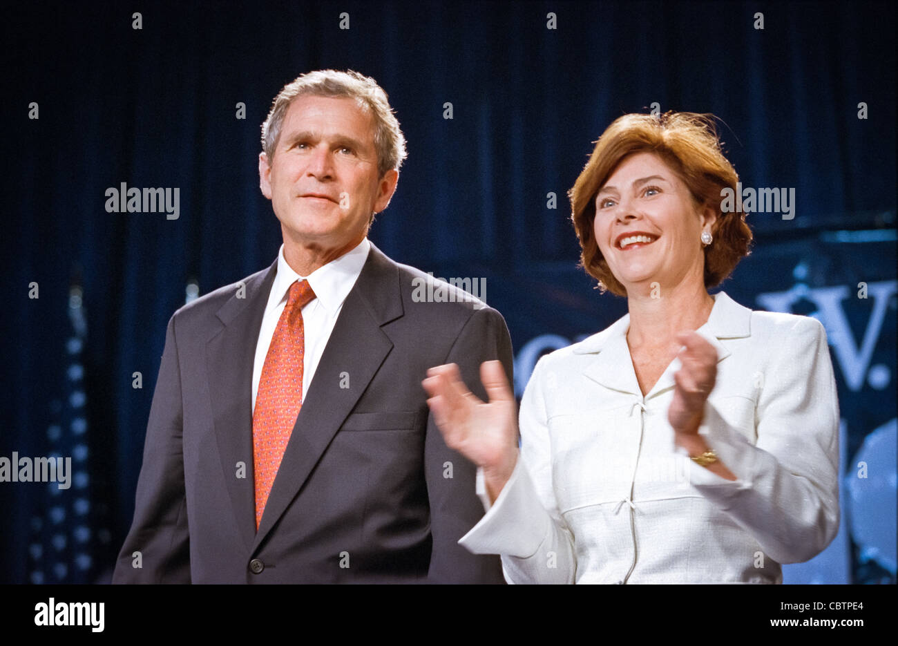 Texas Gov. George W. Bush and his wife Laura during a campaign fundraising event June 22, 1999 in Washington, DC. Bush is the frontrunner for the Republican presidential nomination in the Year 2000. Stock Photo