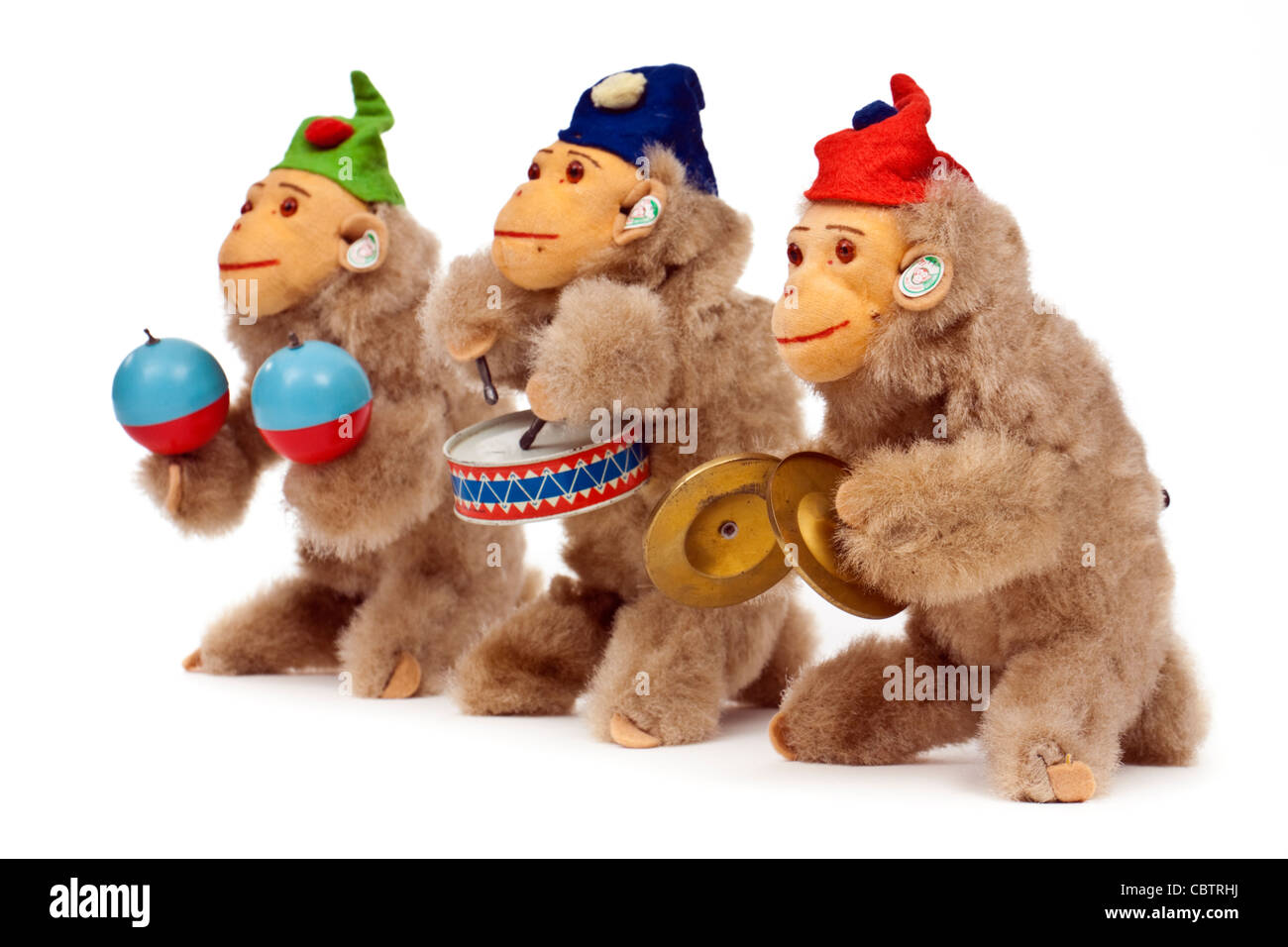 Set of three vintage wind-up 'Jolly Musical Monkeys' from 1956 by DRGM of West Germany Stock Photo