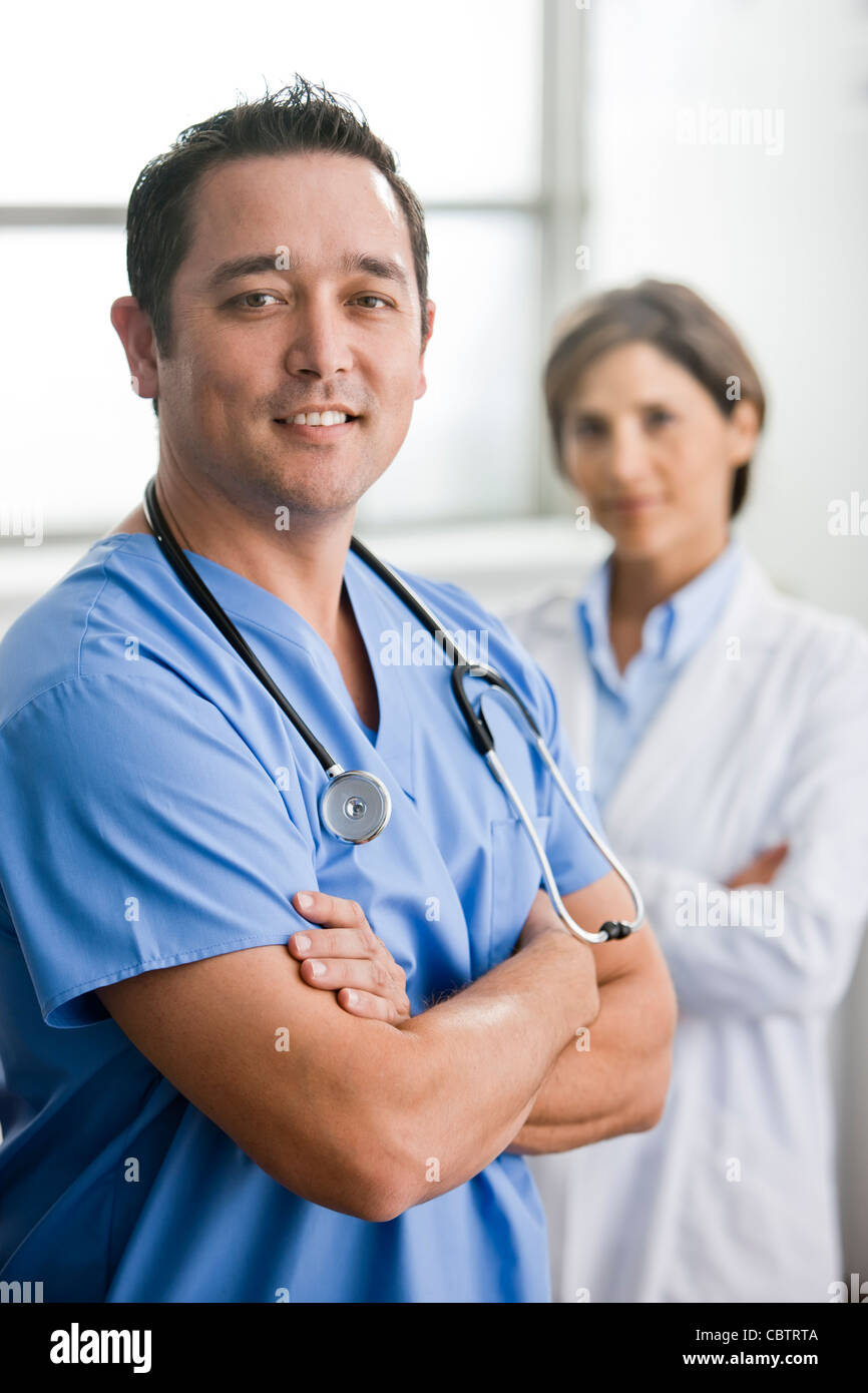 Smiling doctors standing together Stock Photo