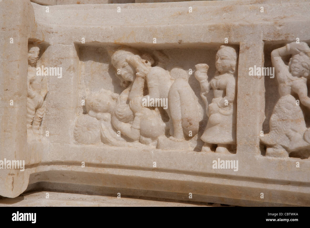 Marble sculpture depicting a passage of the Kamasutra Stock Photo