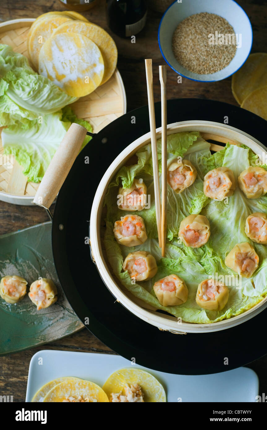Asian dumpling in steamer with cabbage Stock Photo Alamy