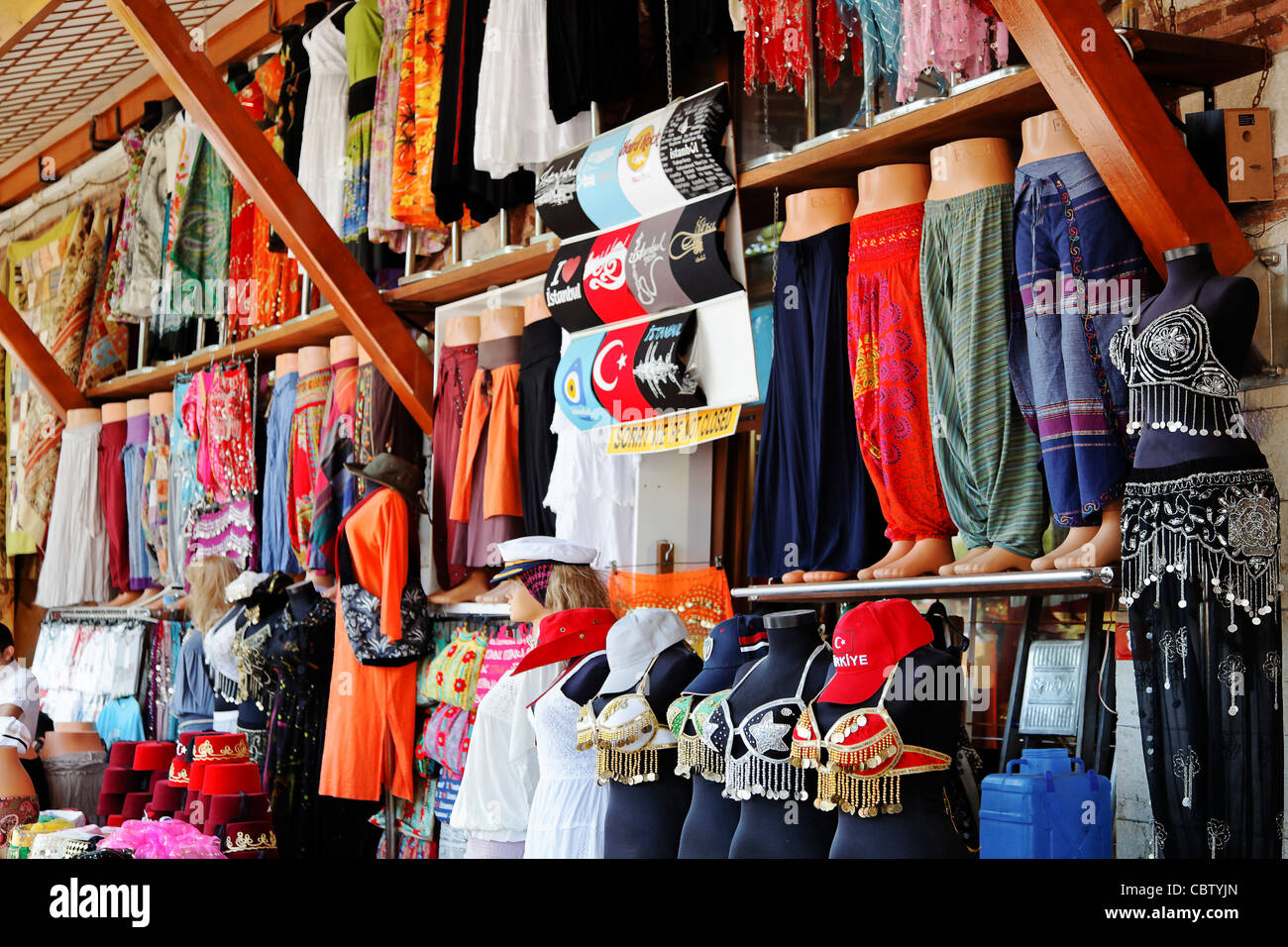 Grande Bazaar Istanbul Turkey, Belly dancing clothes market stall displaying colorful tops, bottoms and accessories Stock Photo