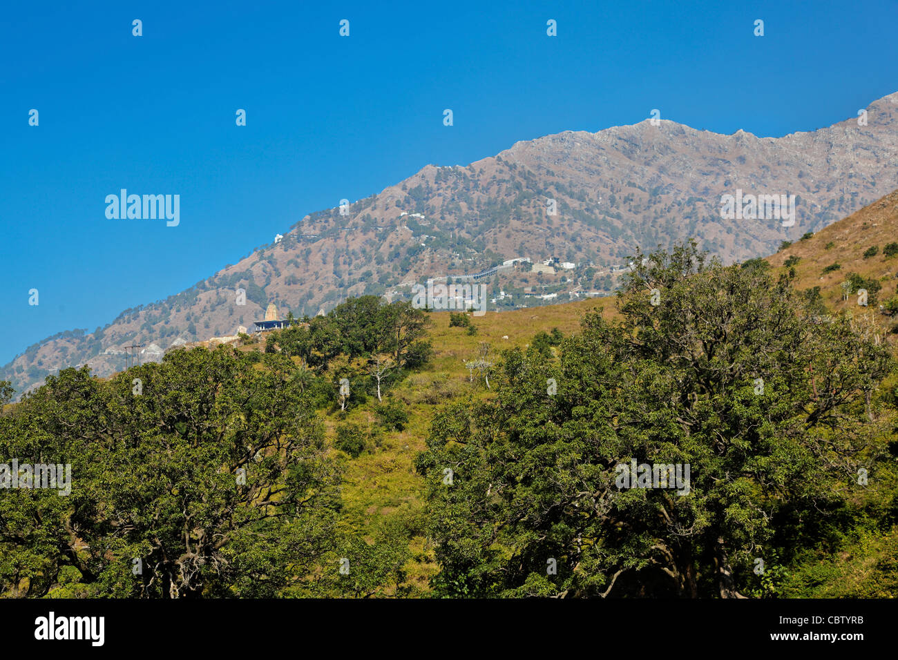 Landscape of Vaishno Devi mountain the Trikuta peak from the heliport at Katra, Himalayas copy space with crop margins Stock Photo
