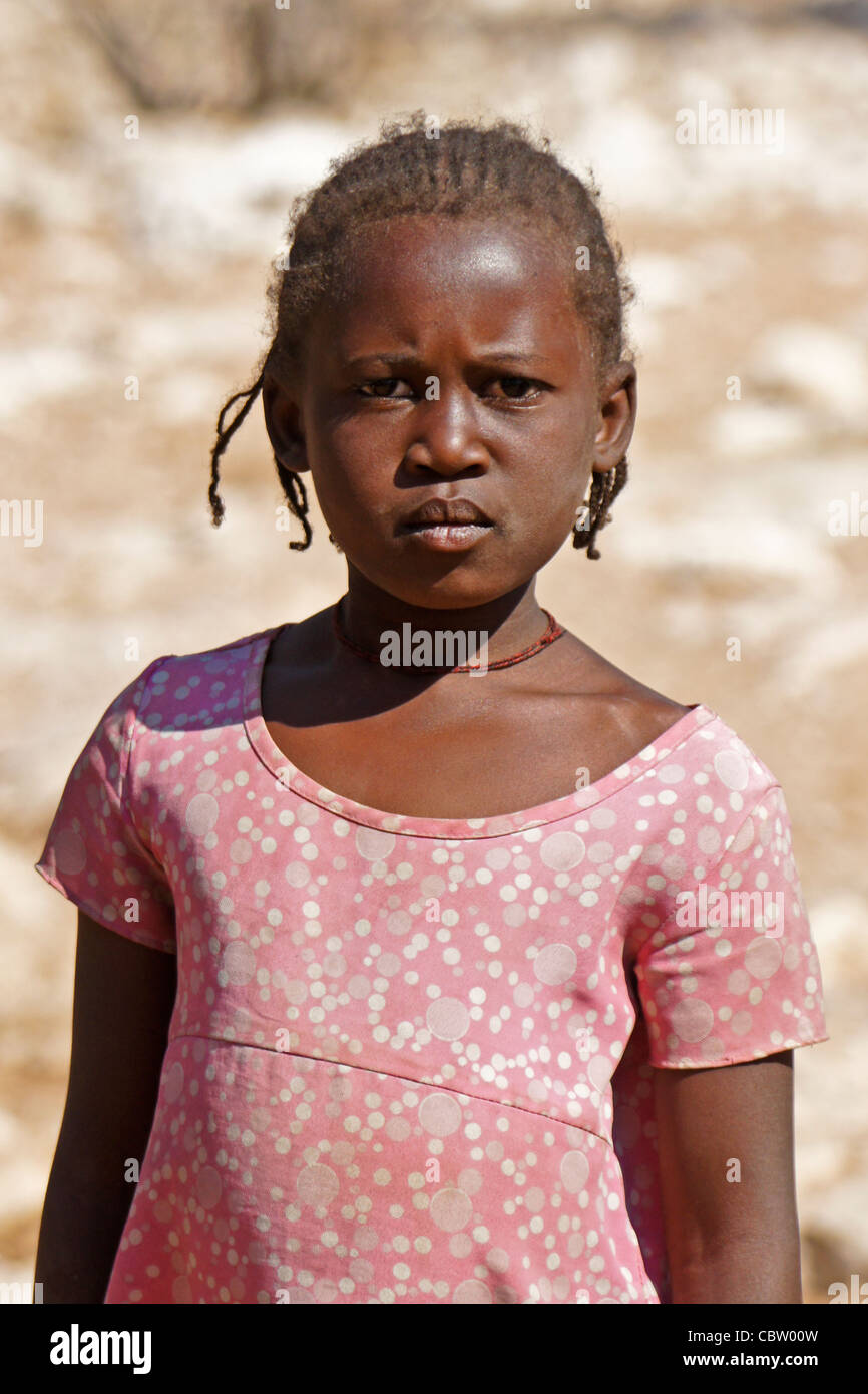 Young Herero girl with braided hair, Damaraland, Namibia Stock Photo