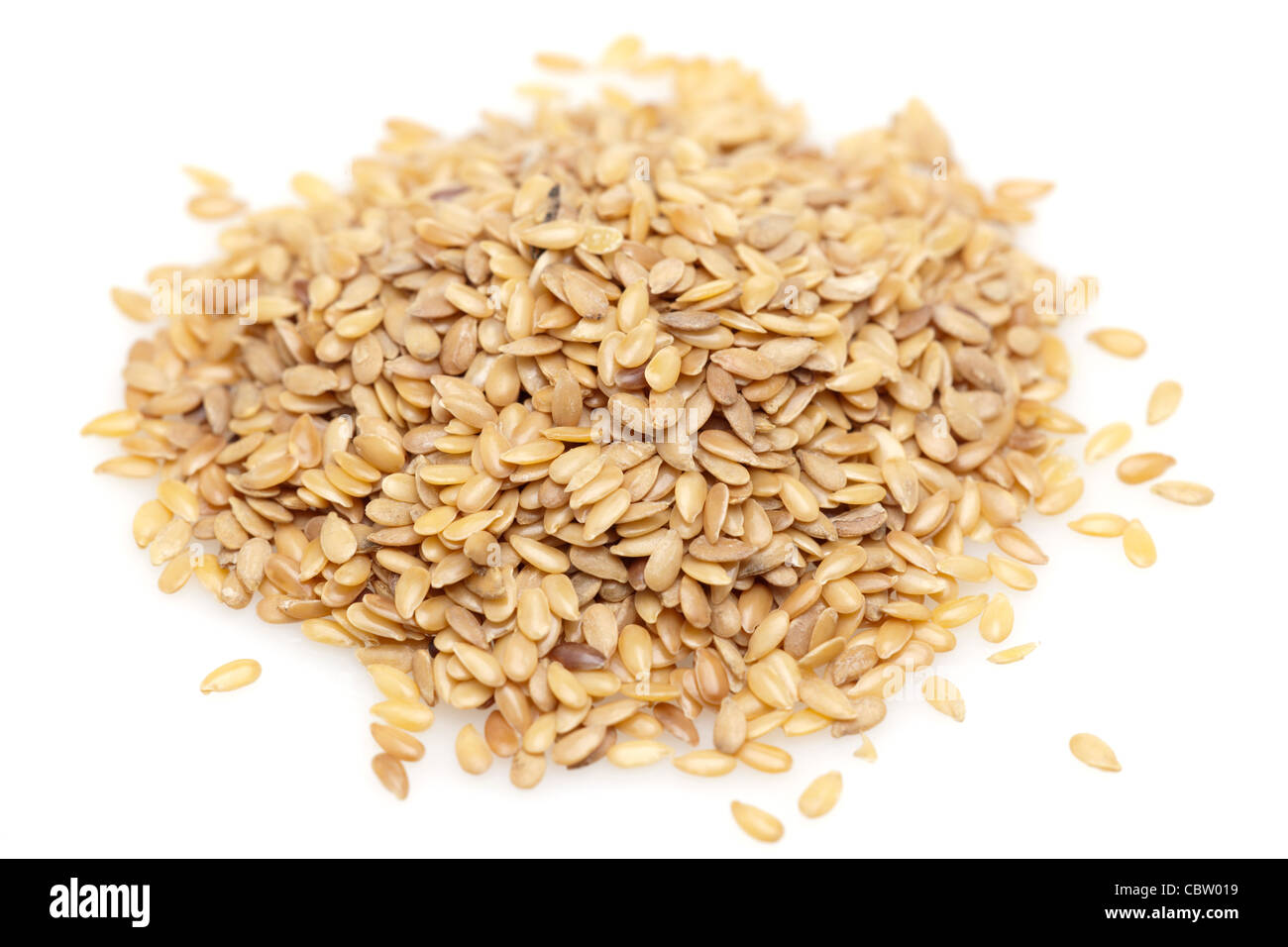 Pile of golden linseed seeds Stock Photo