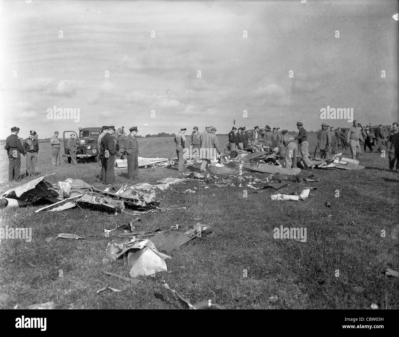 Investigating airplane crash damage in England during WWII Stock Photo Alamy
