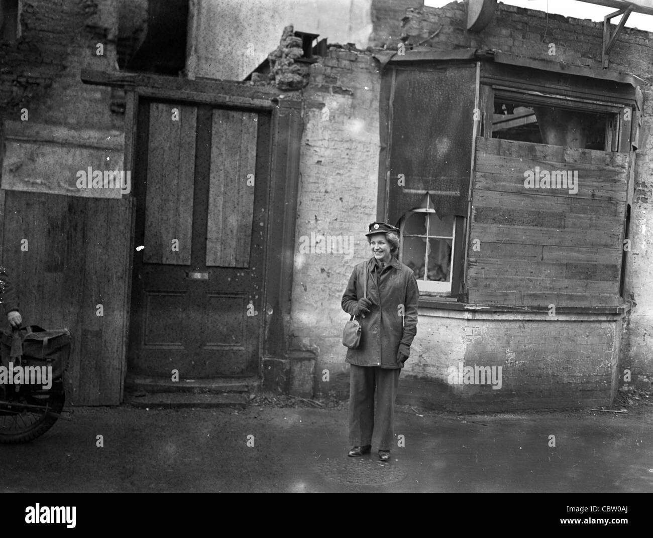 woman posing in front of dilapidated buildings UK britain Stock Photo ...