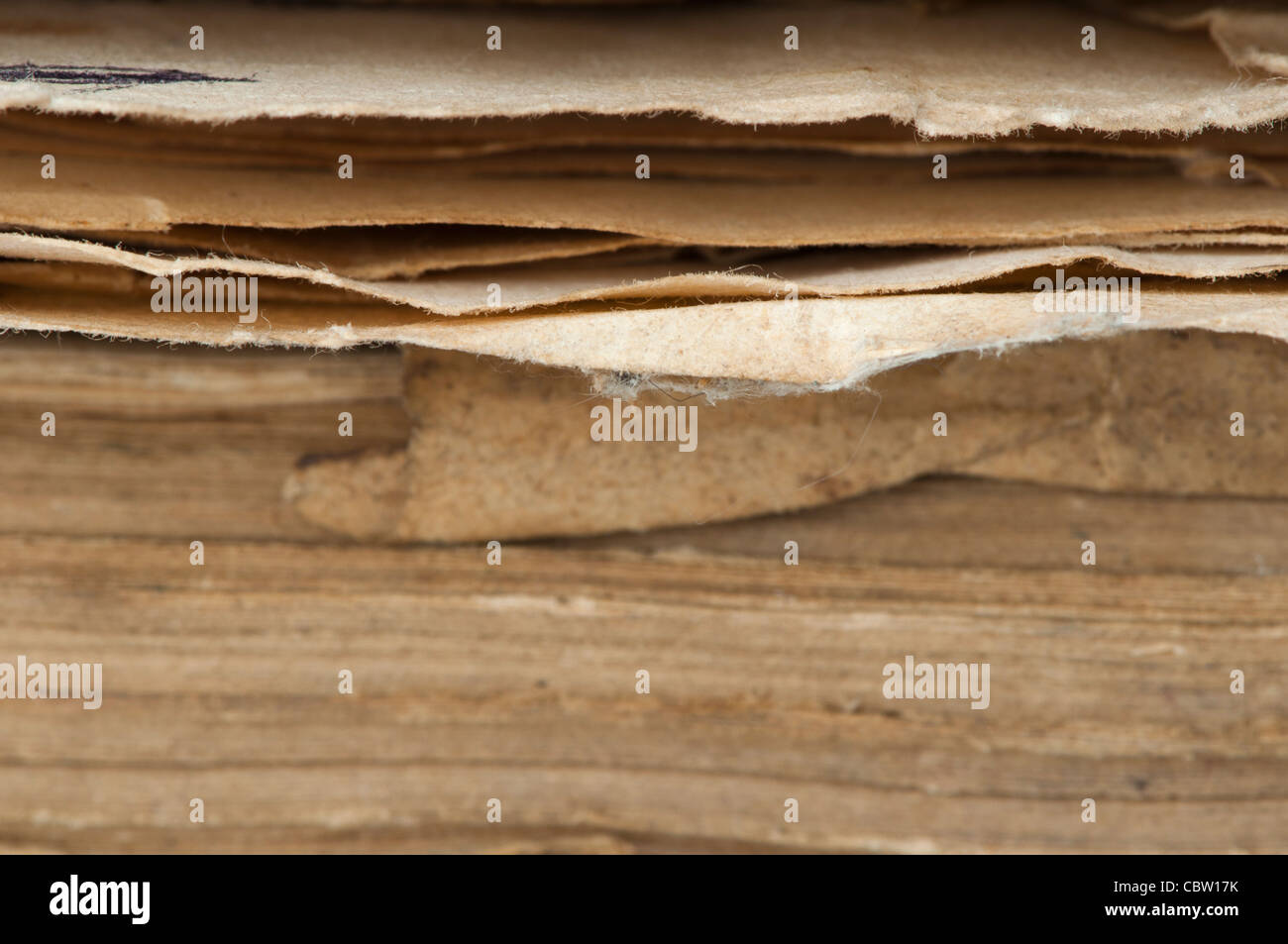 Old worn paper sheets of book Stock Photo