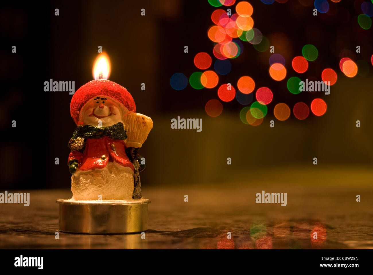candle light in front of the Christmas tree Stock Photo