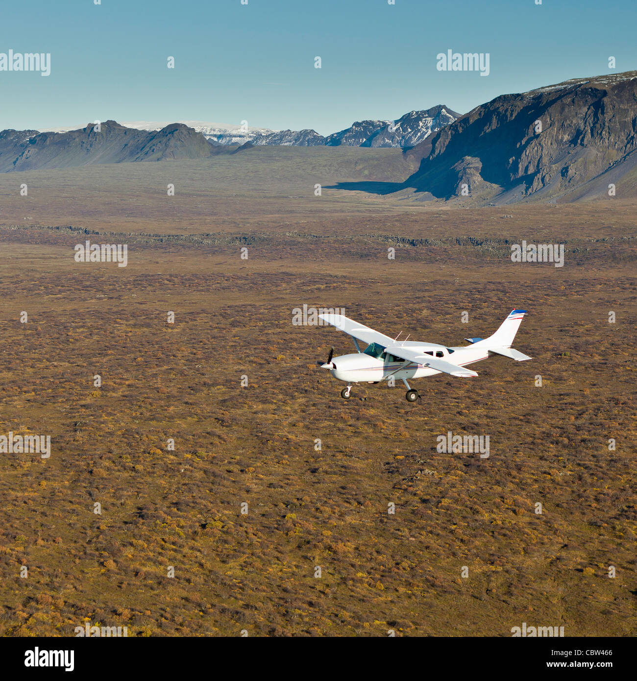 Cessna flying over South Coast Iceland Stock Photo