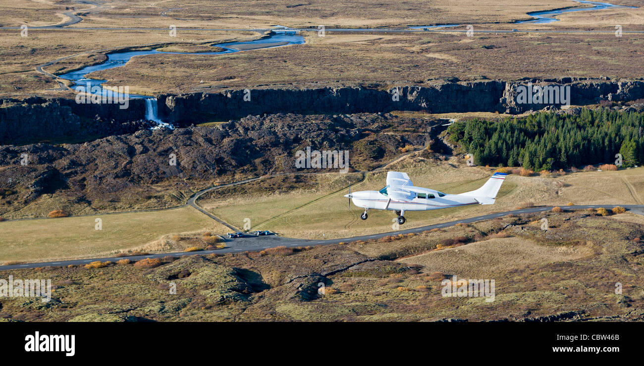 Cessna flying over the Mid Atlantic Ridge, Thingvellir National Park, Iceland Stock Photo