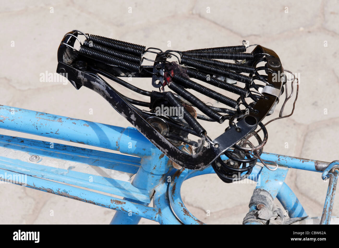 A painful bicycle seat Stock Photo Alamy