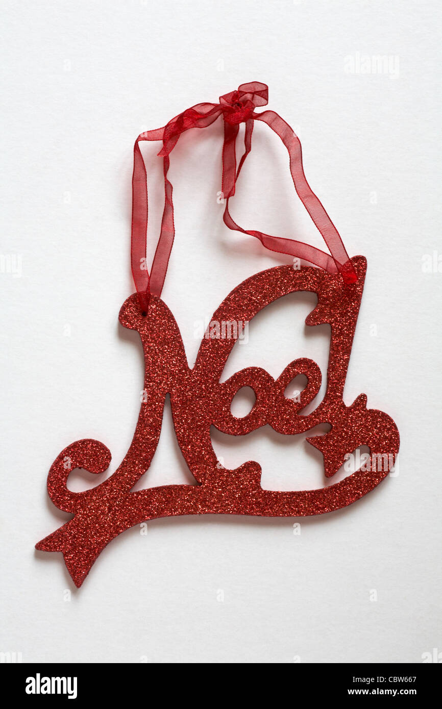 Red glittery Noel Christmas hanging decoration isolated on white background Stock Photo
