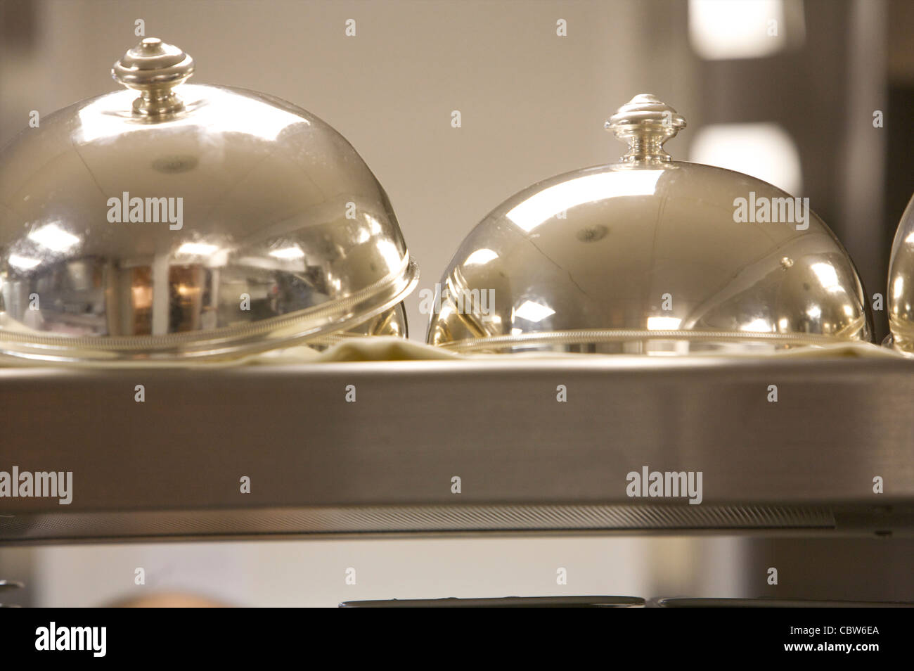 Restaurant Patrick Guilbaud - Two Cloche on the pass waiting to be used. Stock Photo