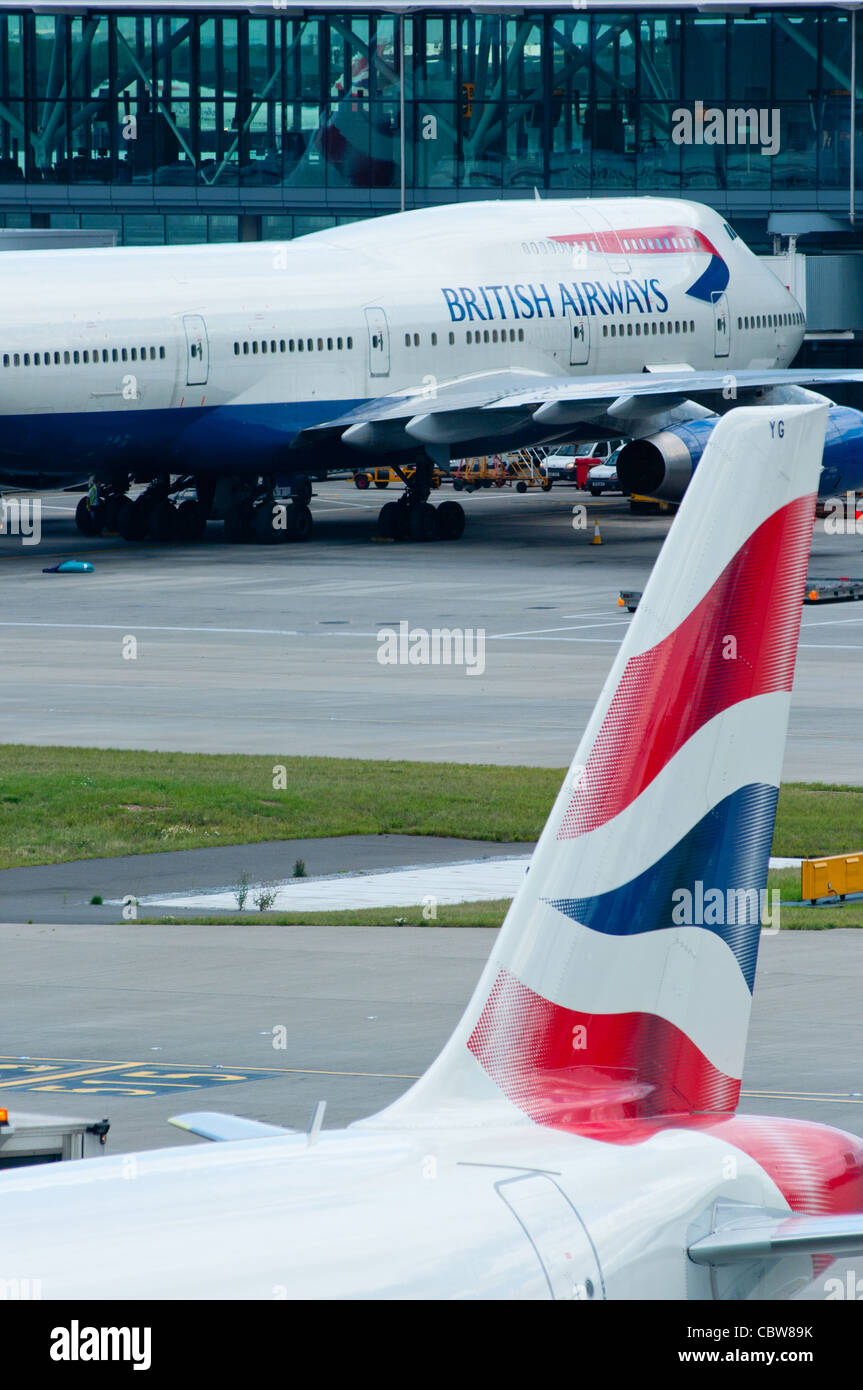 British Airways aircraft at Terminal 5 of Heathrow airport, London, England. Stock Photo