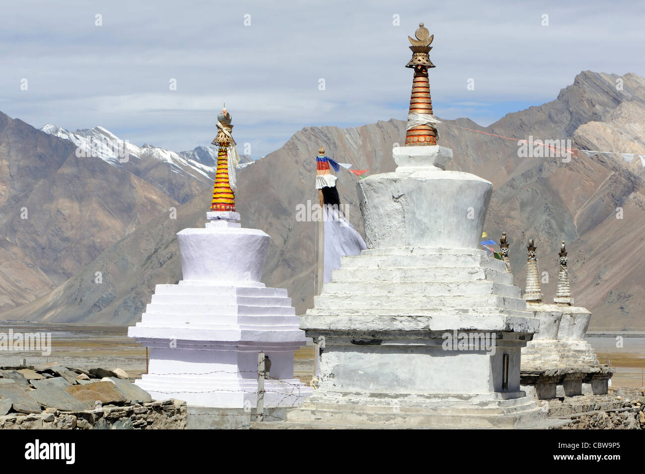 White chortens, stupas,  in the village of Rangdum in Zanscar. Rangdum, Zanscar, Ladakh. Stock Photo