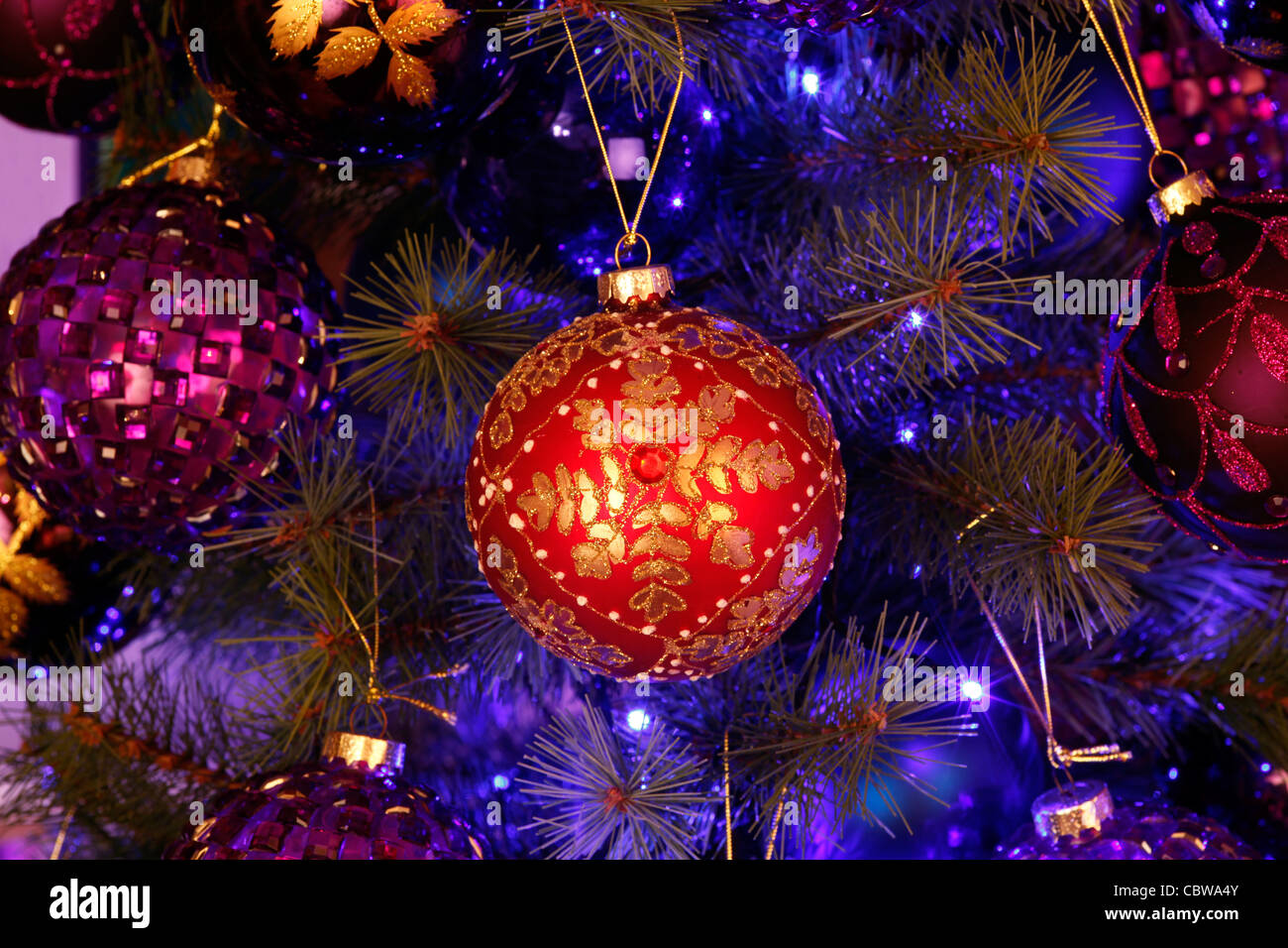 Baubles hanging on a Christmas tree Stock Photo