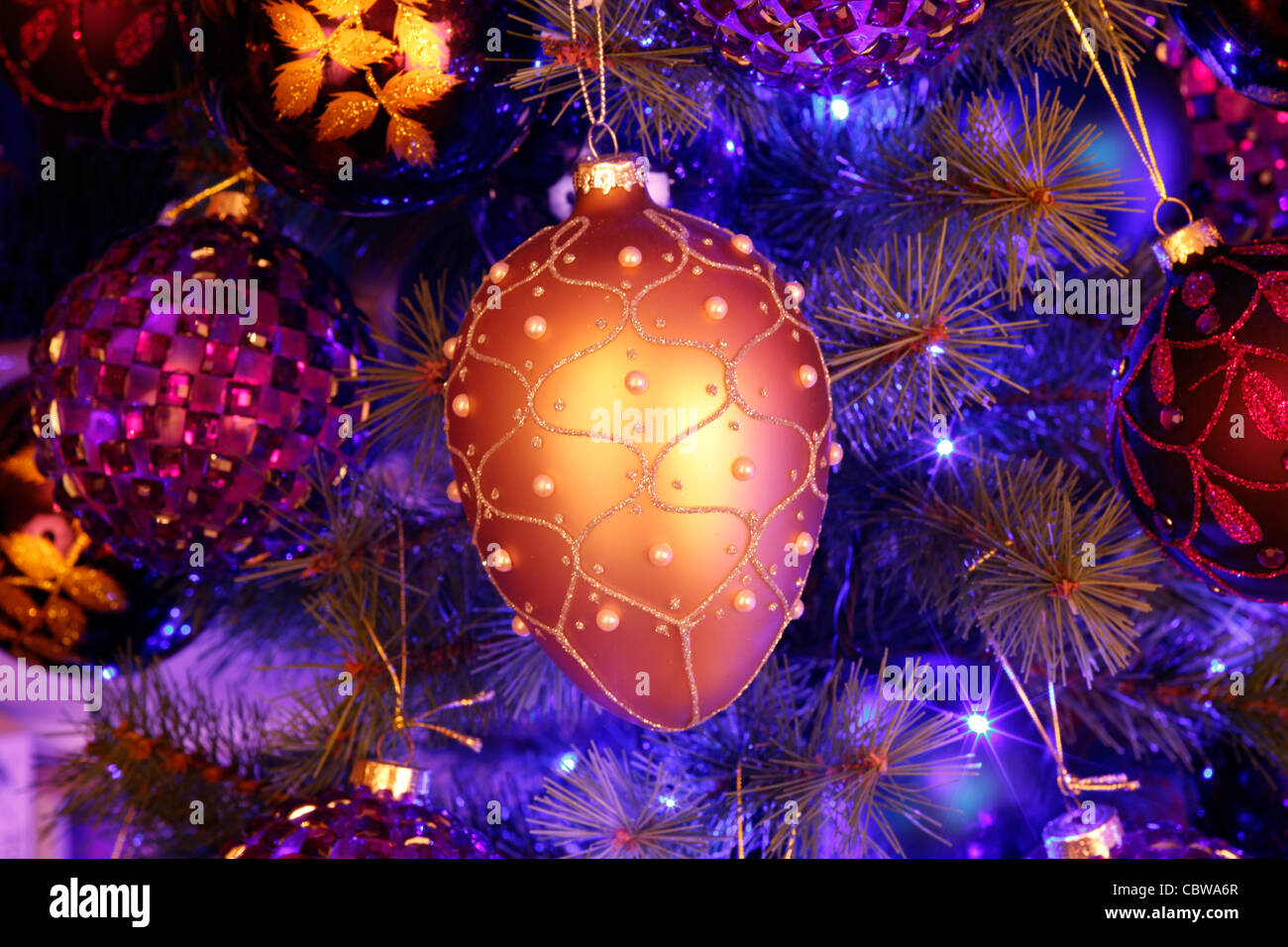 Baubles hanging on a Christmas tree Stock Photo - Alamy