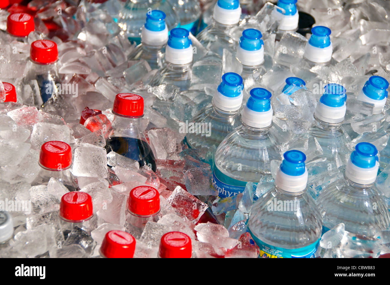 Plastic bottles of water and soda on ice at Universal Studios Orlando Florida Stock Photo