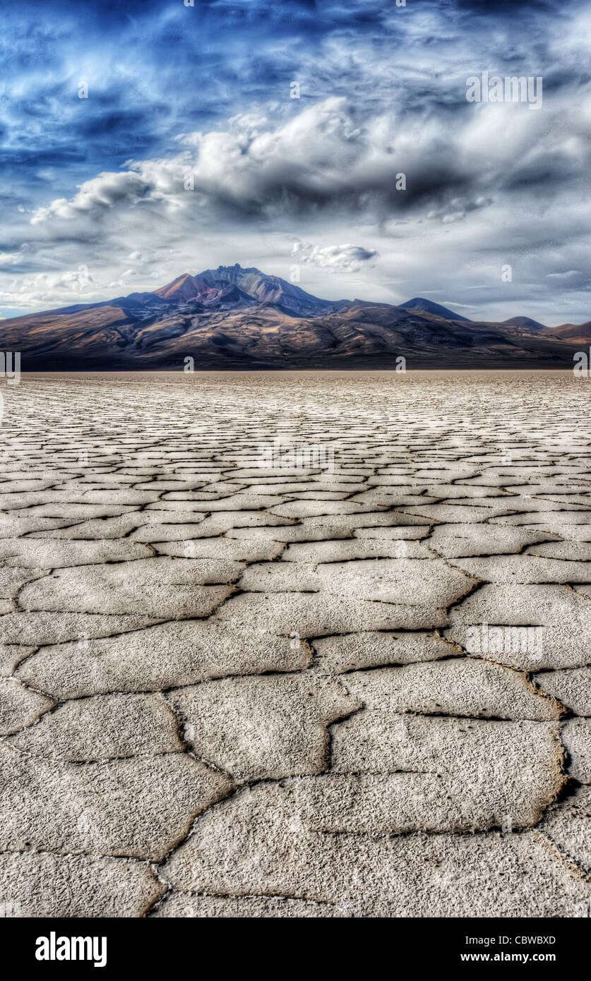 The Salar de Uyuni in Southwest Bolivia with the volcano Tunupa Stock Photo