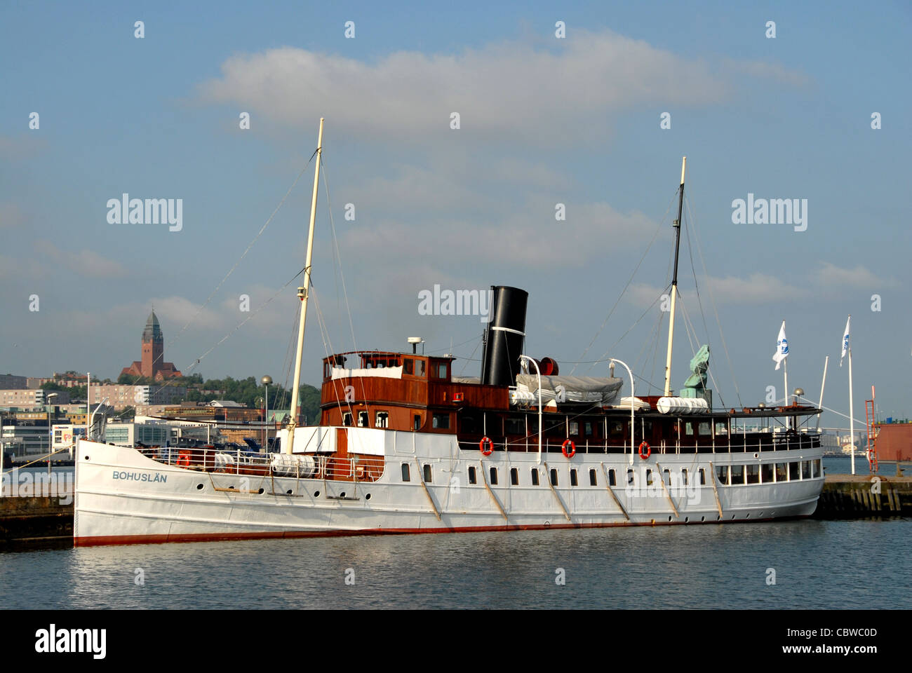 The vintage steamer MS Bohuslän moored at a quay in the port of