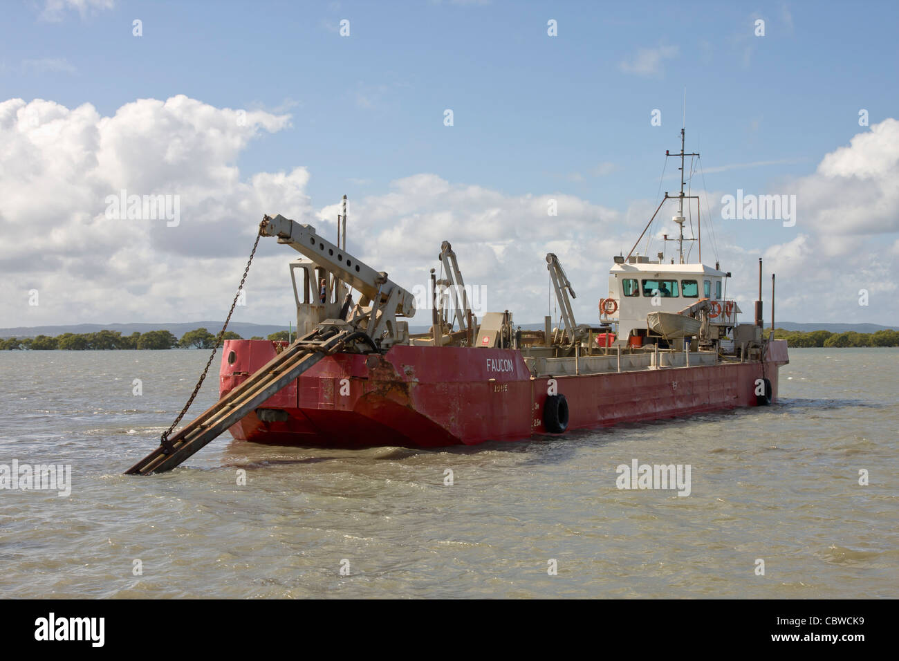 The suction hopper dredger 'Faucon' is used to keep shipping channels clear in Moreton Bay - Brisbane Stock Photo