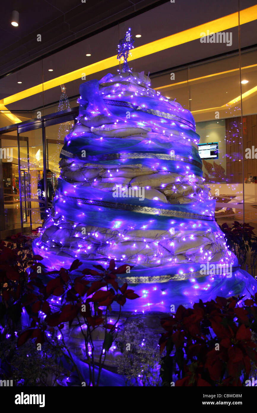 Christmas tree made from sandbag after floodwater in Thailand reduced