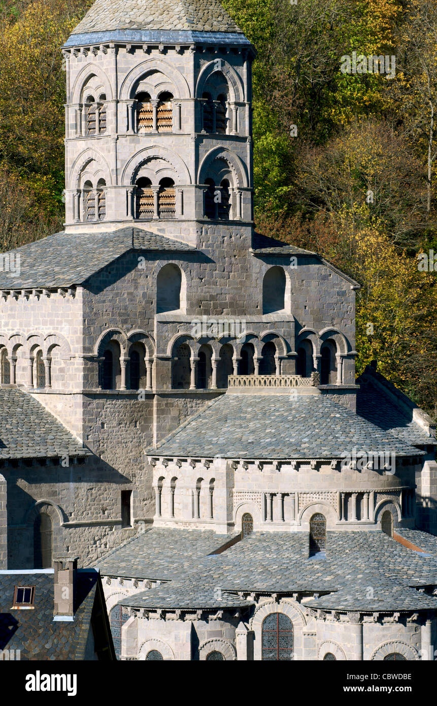 Basilica Notre Dame d'Orcival. Natural regional park of volcans d'auvergne. Puy de Dome. Auvergne Rhone Alpes. France Stock Photo