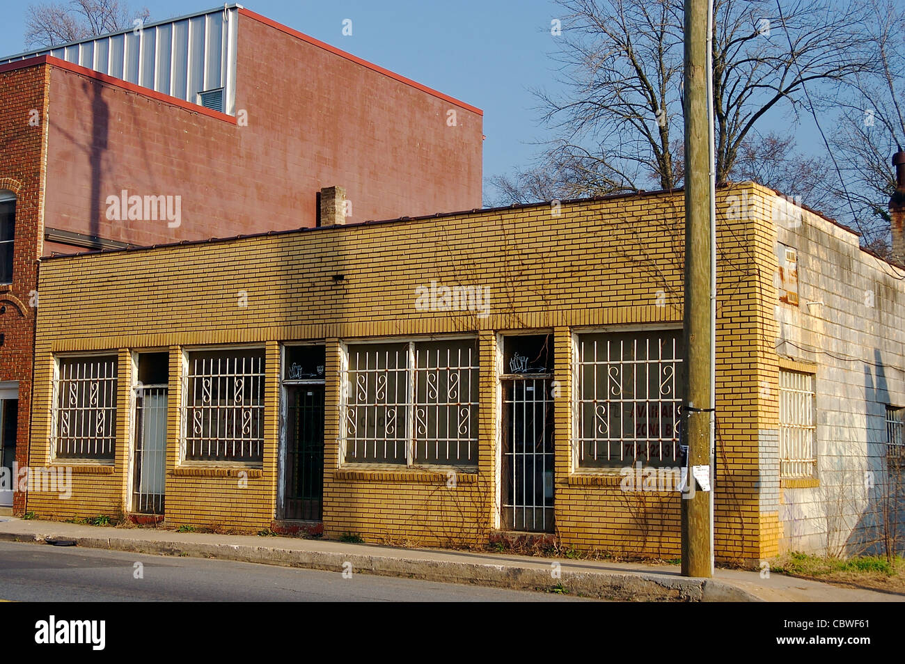 A yellow brick building in Charlotte, North Carolina, United States Stock Photo
