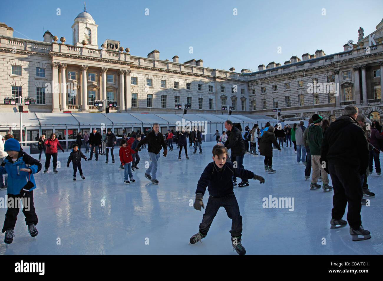 People skating at the Ice rink at Somerset House, London during ...