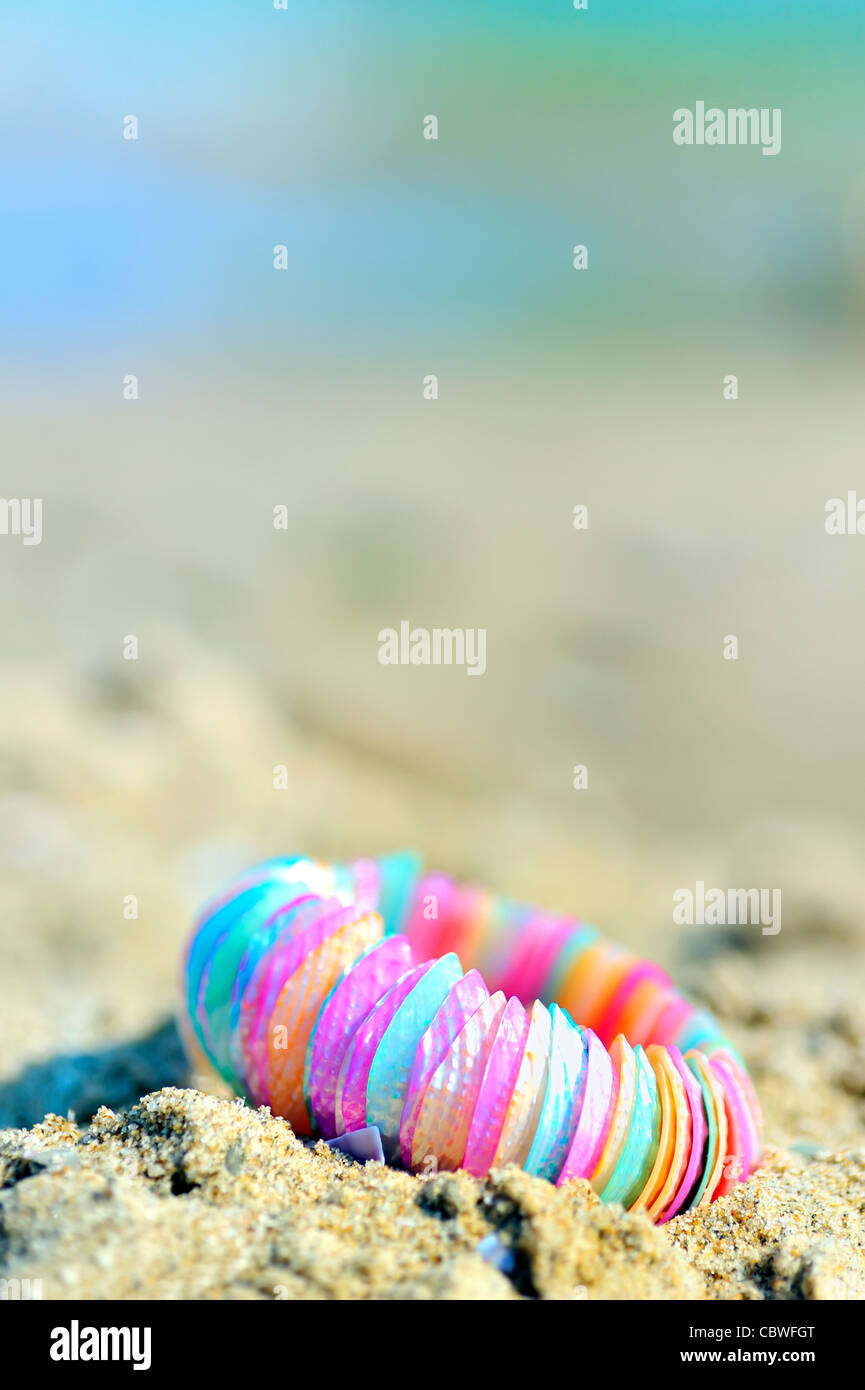 shell bracelet on beach Stock Photo