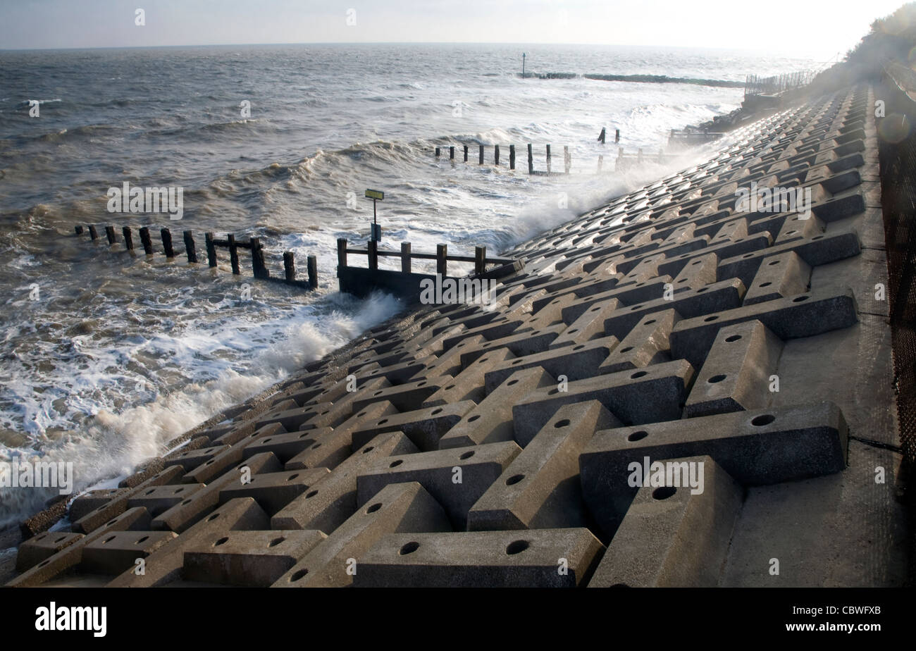 Wave swash hitting sea wall, Felixstowe, Suffolk, England Stock Photo