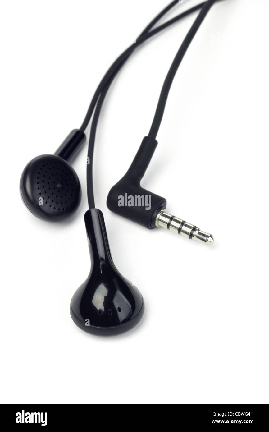 Black audio earphone and jack on white background Stock Photo