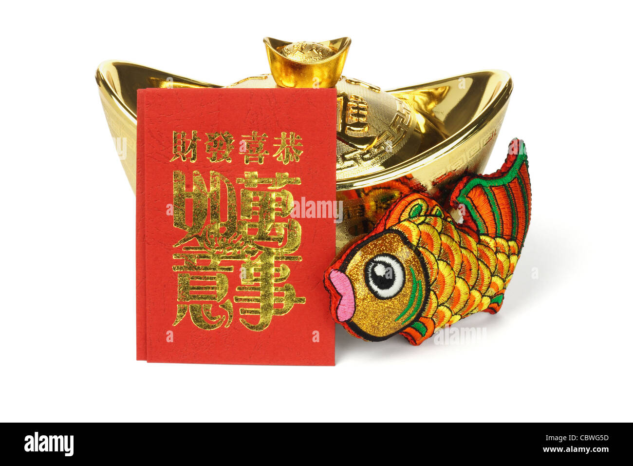 Chinese New Year red packets and auspicious ornaments on white background Stock Photo