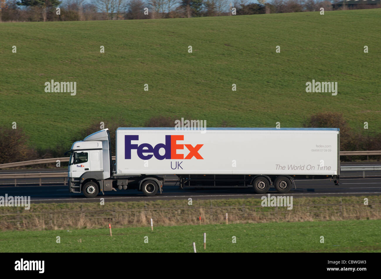 FedEx lorry on M40 motorway, Warwickshire, UK Stock Photo