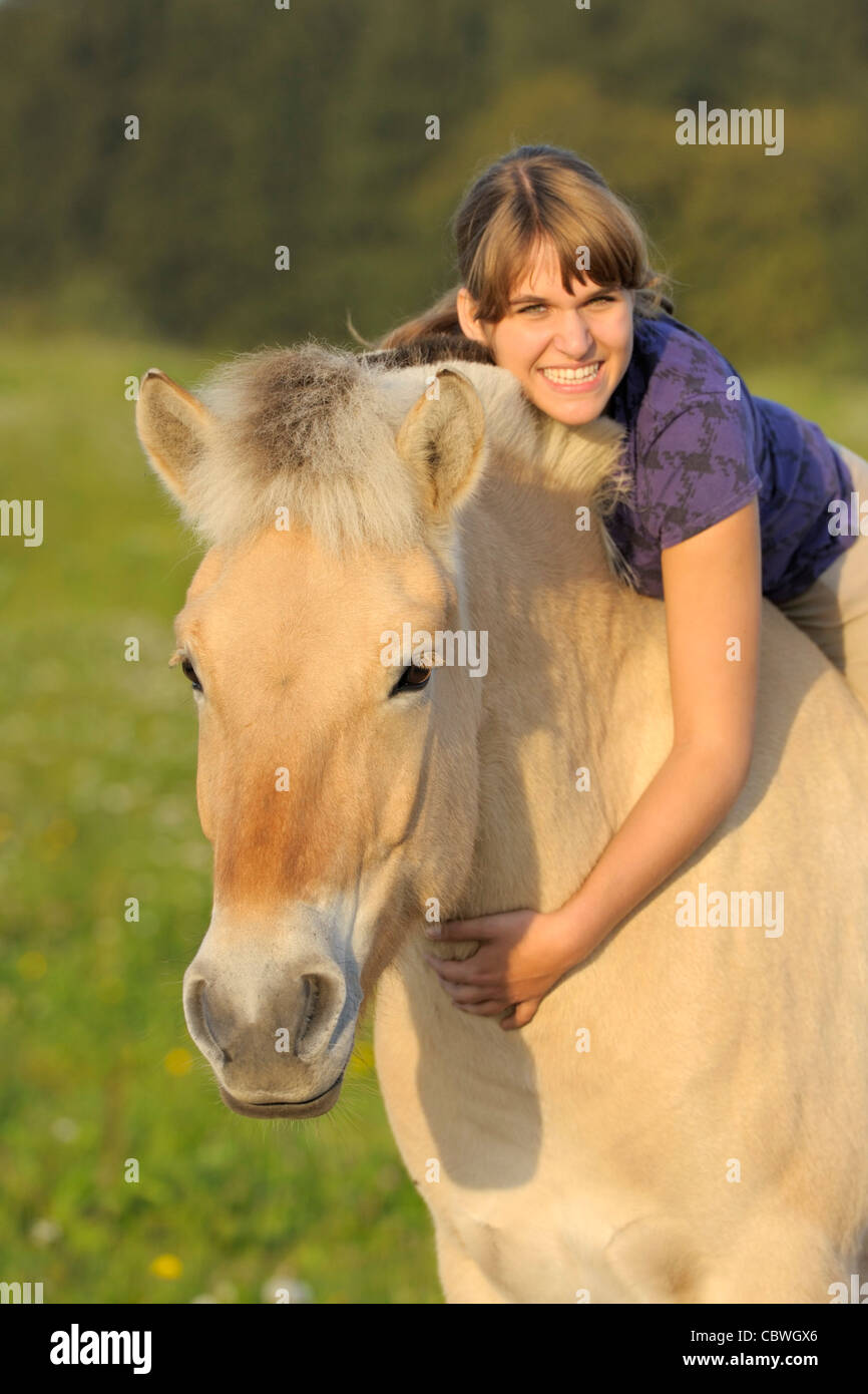 Girl with Norwegian horse Stock Photo Alamy