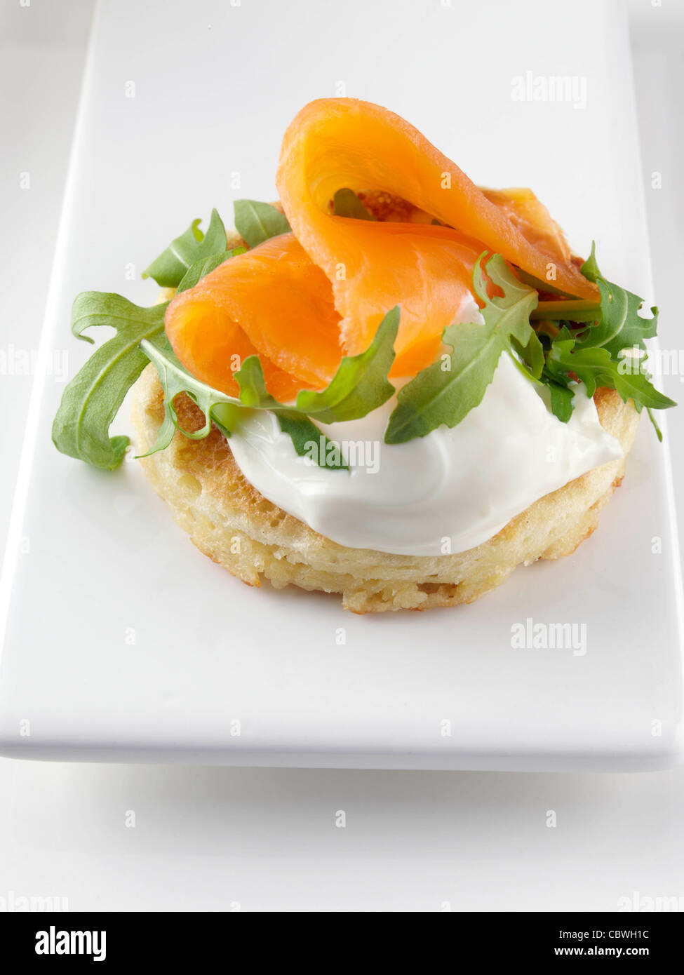 Blini with smoked salmon salmon roe and sour cream Stock Photo - Alamy