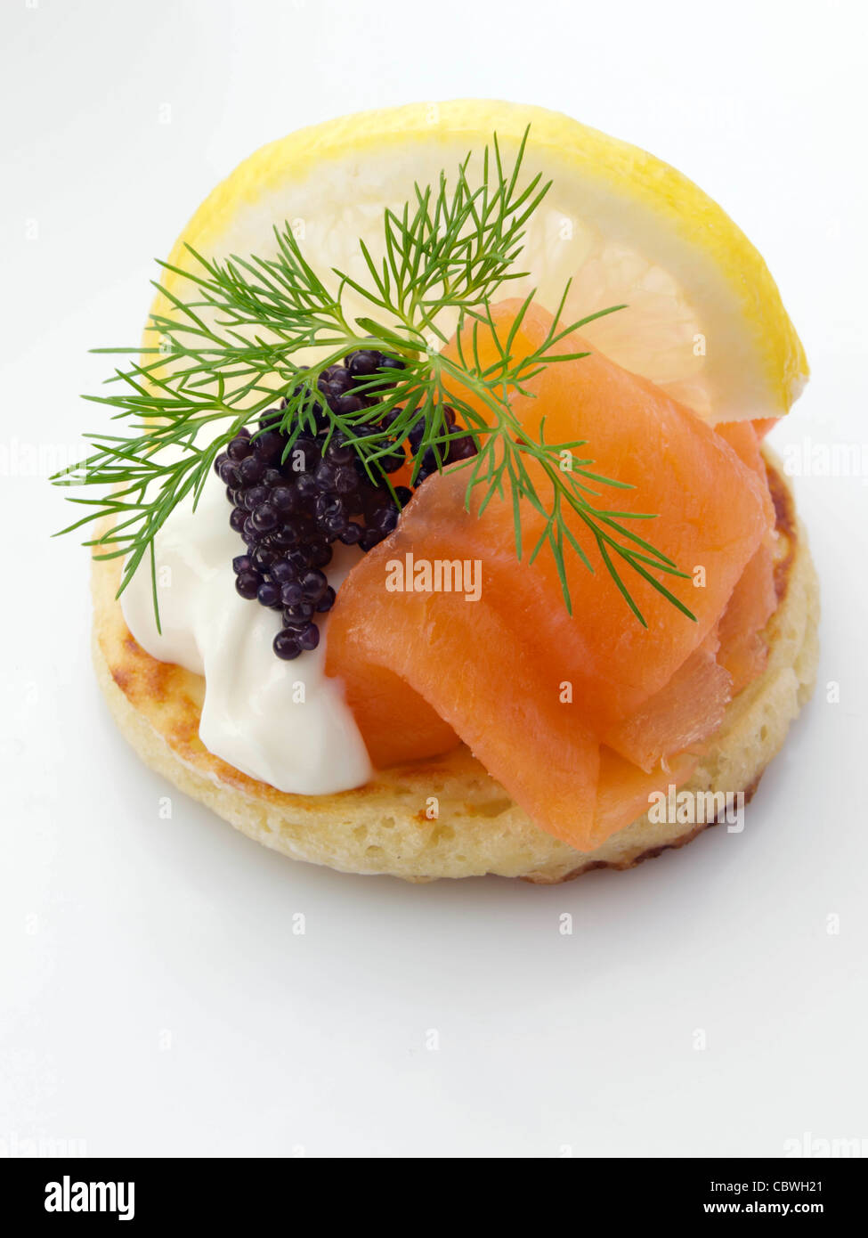 Smoked salmon sour cream dill blini Stock Photo Alamy