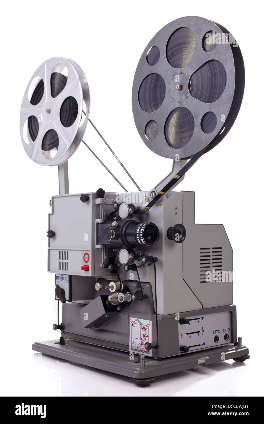 Vintage 8mm home movie projector and film cans isolated on white