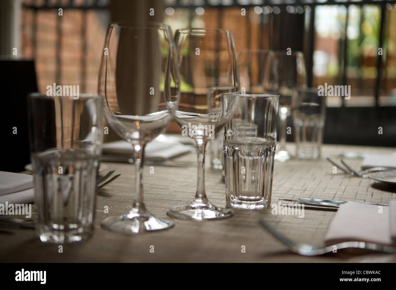 Modern Restaurant Interior with table set Stock Photo - Alamy
