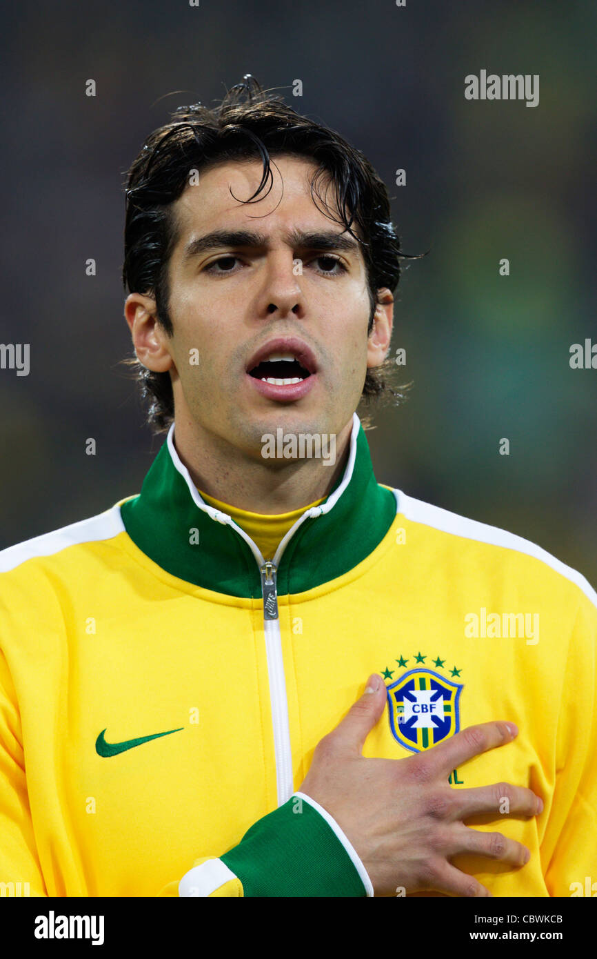 Kaka of Brazil sings the national anthem before a 2010 FIFA World Cup match against Ivory Coast at Soccer City Stadium. Stock Photo