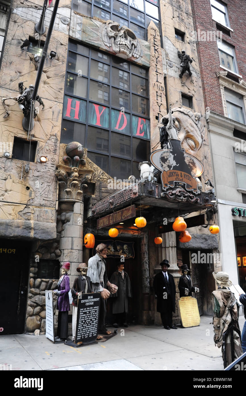 Portrait African-American doorman, orange lanterns marquee, Gothic Horror entrance, Jekyll and Hyde Club, 6th Avenue, New York Stock Photo